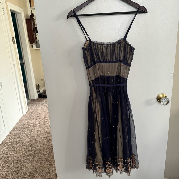 Anthropologie ODILLE "Winter Prelude" Size 2 mesh overlay
Embroidered Dress - Picture 8 of 10